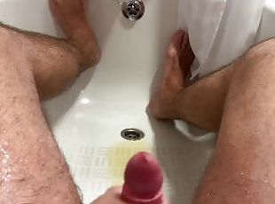 girl peeing on his dick while he jerks off