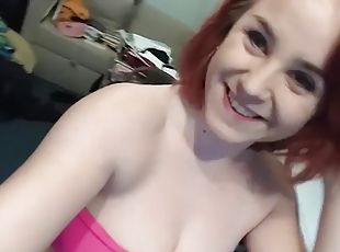 Amateur redhead hangs clothes on her nipples and clit