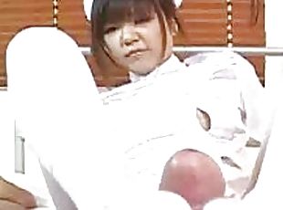 Asian nurse in a satin dress gives a footjob and handjob