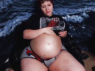 Stunning pregnant bares her huge belly and boobs