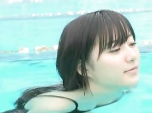 Japanese chick in black swimsuit in the pool