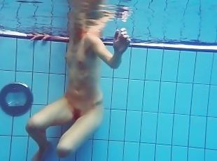 Beautiful ginger hairy pussy underwater