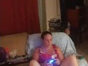 Real Amateur Milf Lifts Up Her Dress So You Can See Her Panties While She Plays Video Games
