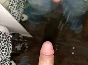 Young stud jerks off in front of mirror hands free cumshot