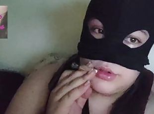 Masked chubby smokes in bed